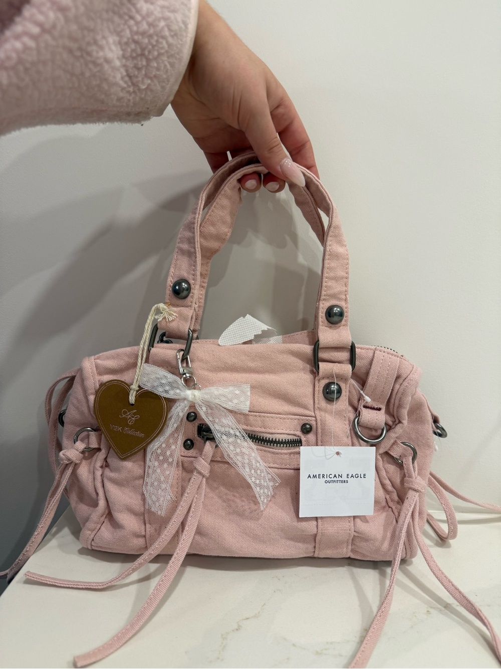 american eagle mini messenger bag in light pink